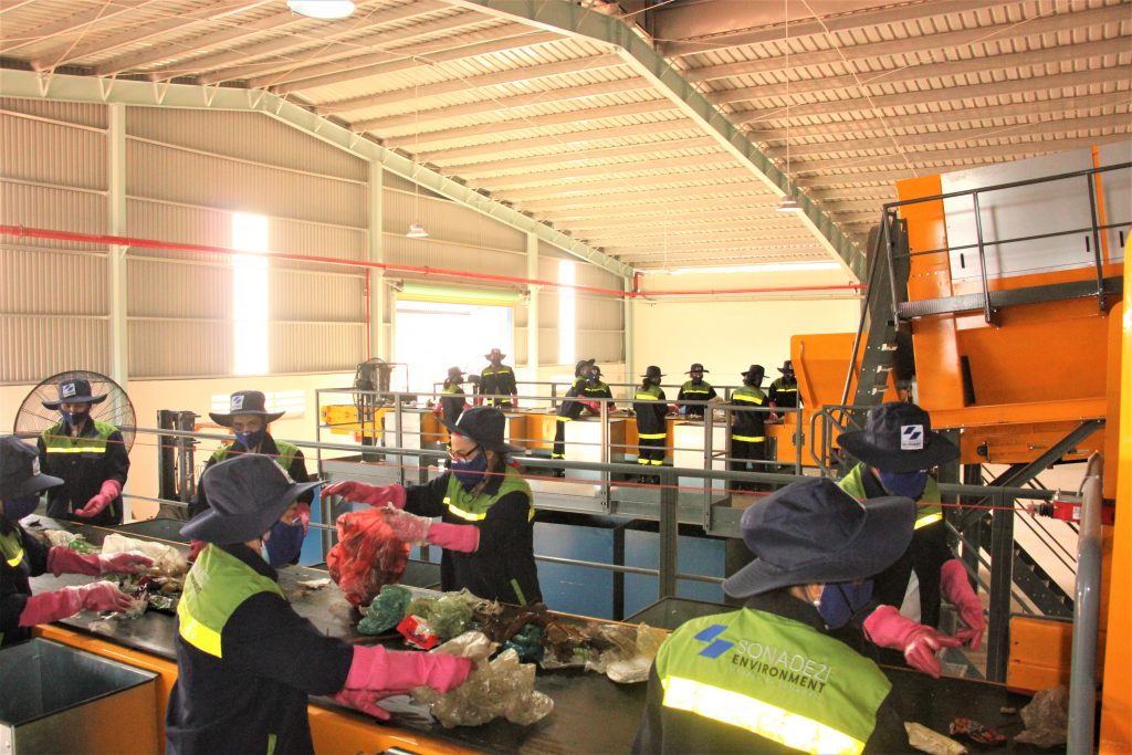Workers were operating 2 waste sorting lines